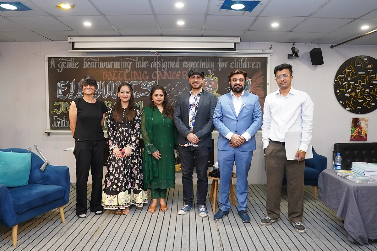 The team behind Elephants in the Room together on stage at the end of the launch event.