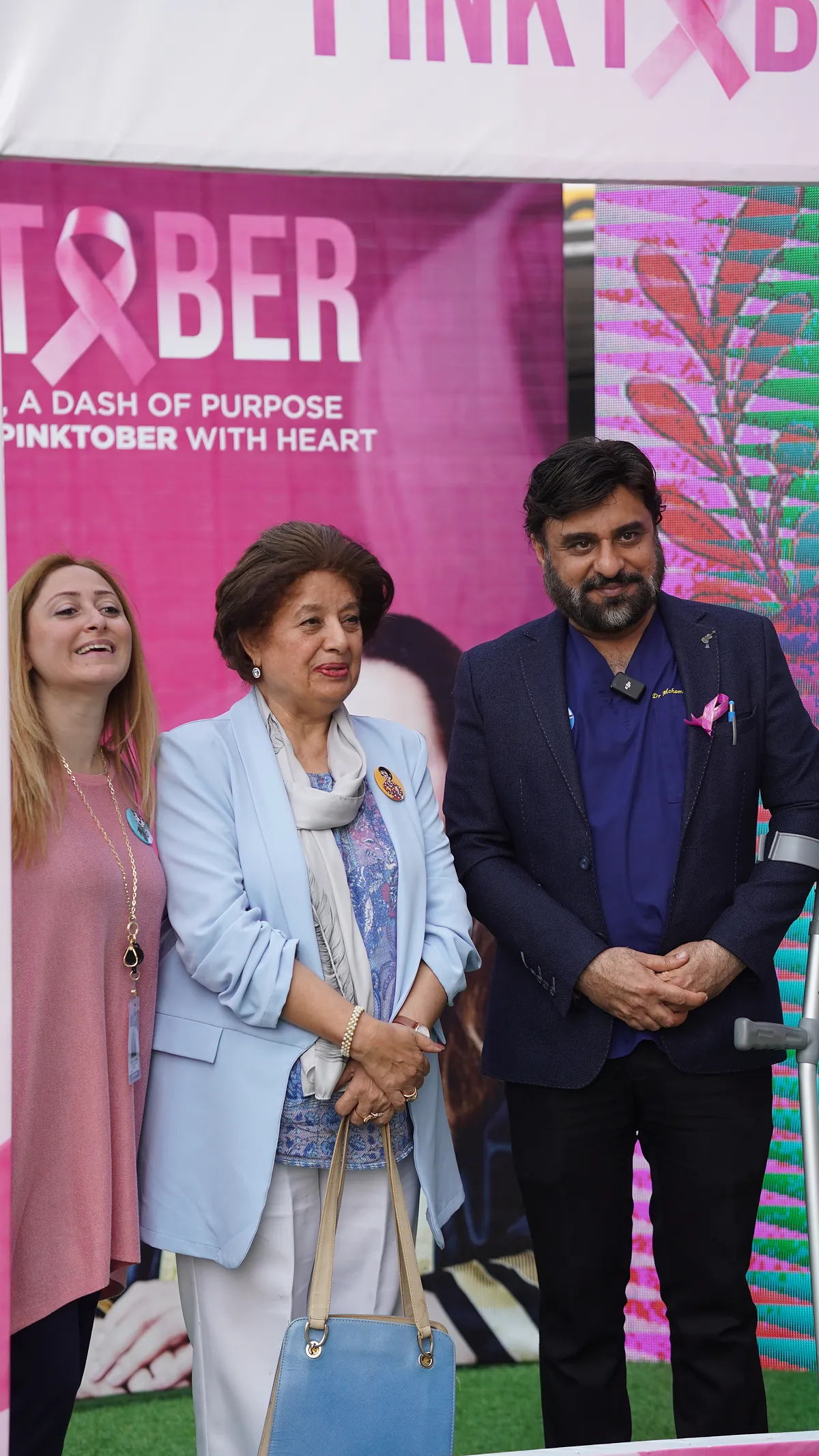 Organisers and guests photographed together at the school's Pinktober breast-cancer awareness event.
